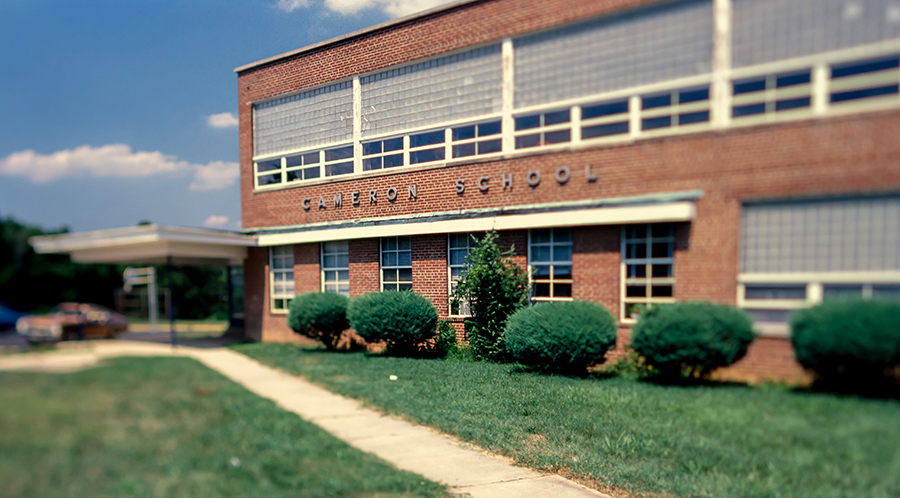 Color photograph from a 35 millimeter slide showing the original main entrance of Cameron Elementary School.